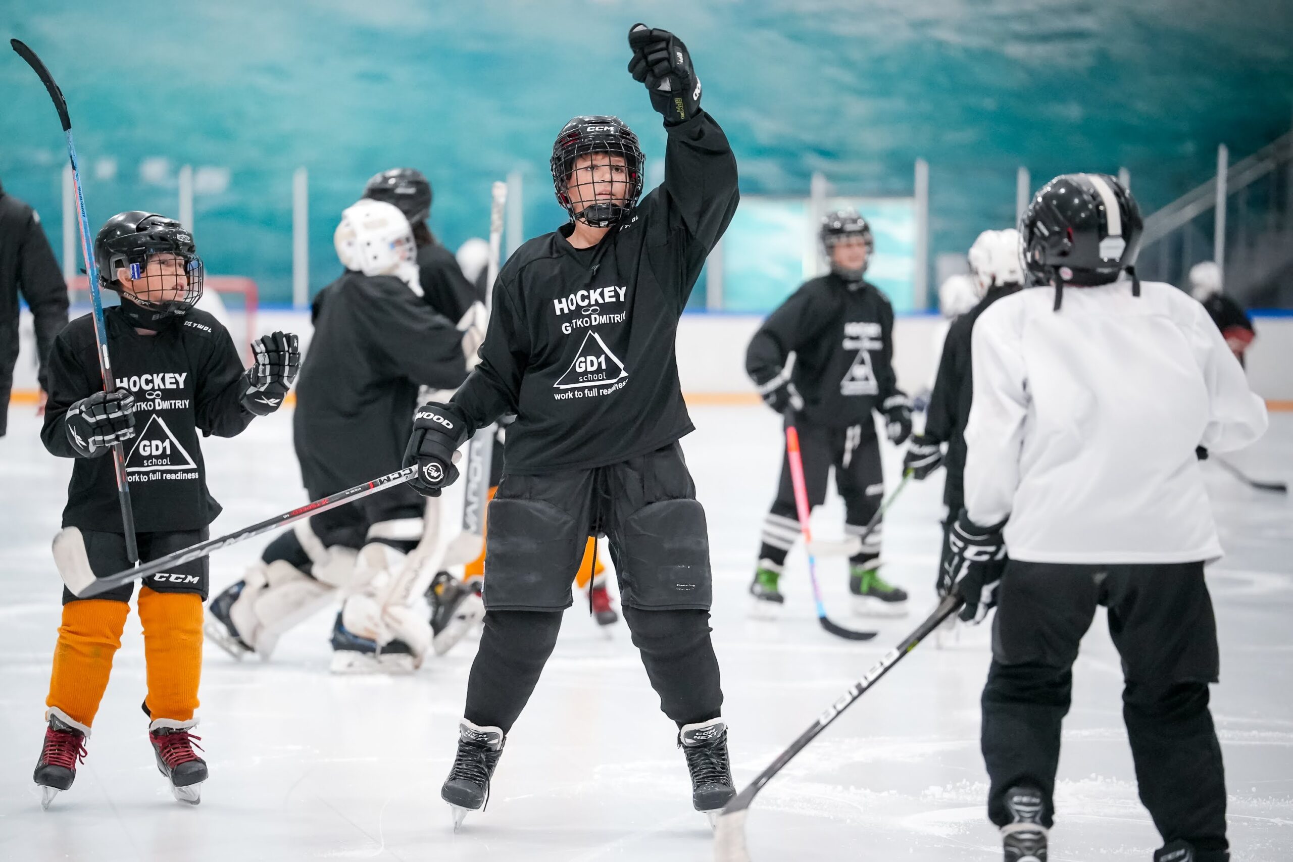 Players practicing together on the ice